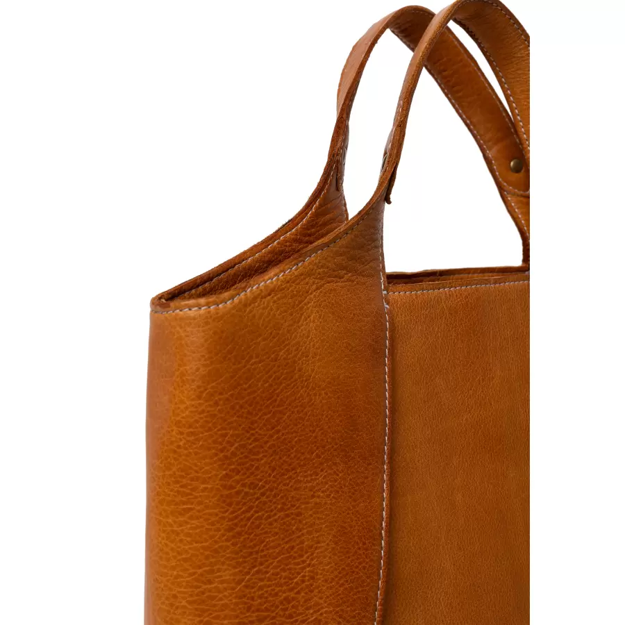 REDESIGNED - Jona Small, burned tan