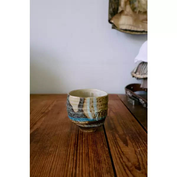 HK living - Artist  ceramics:  coffee cup,  scratched